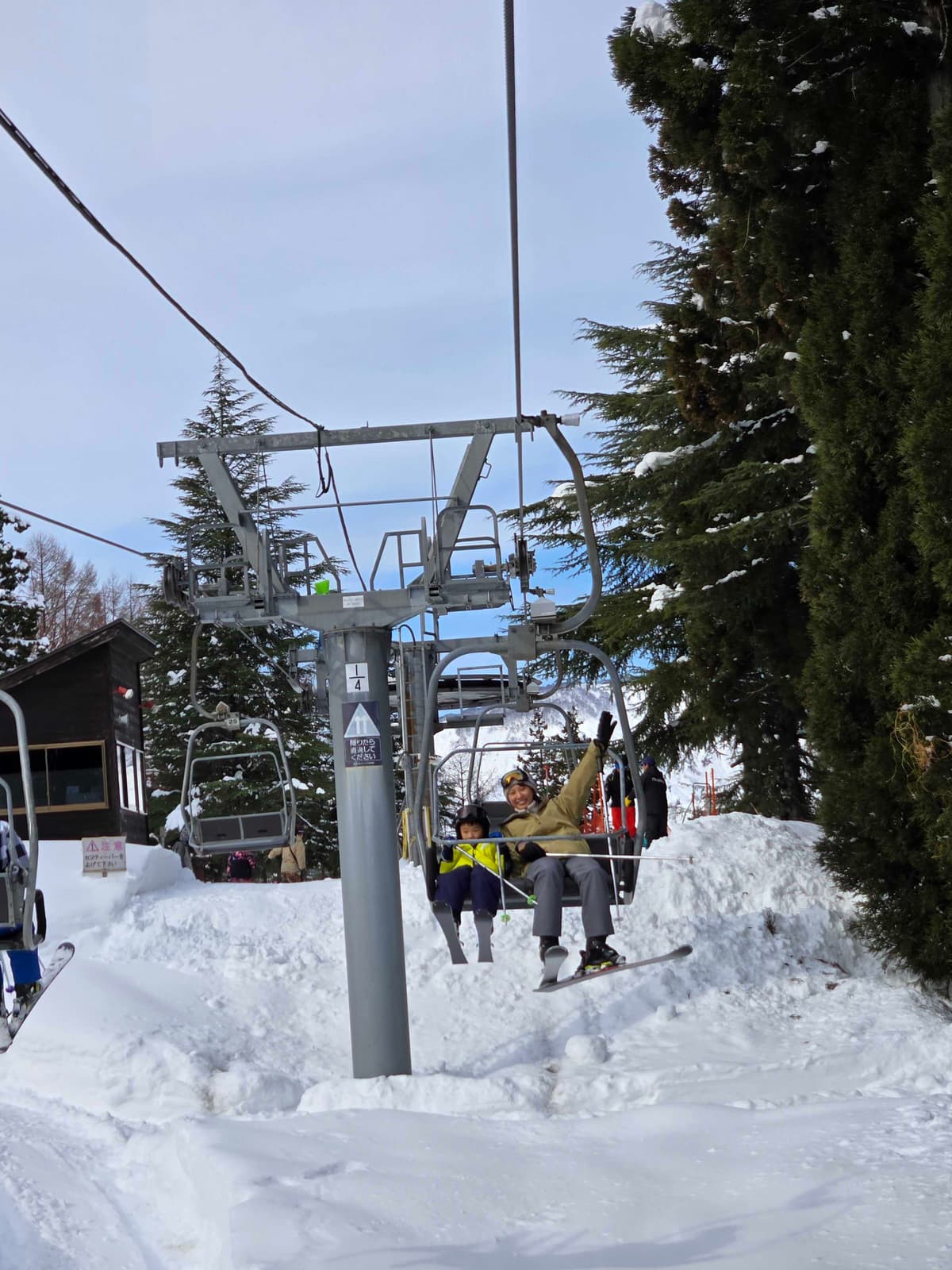 Yurie, Founder of HakubaHub, on a ski lift in Hakuba