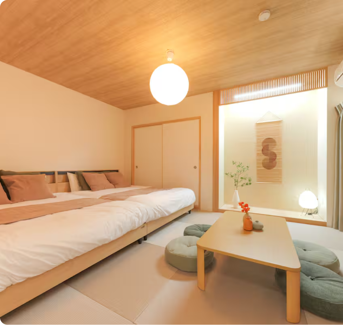 Japanese tatami bedroom with traditional futon and modern beds