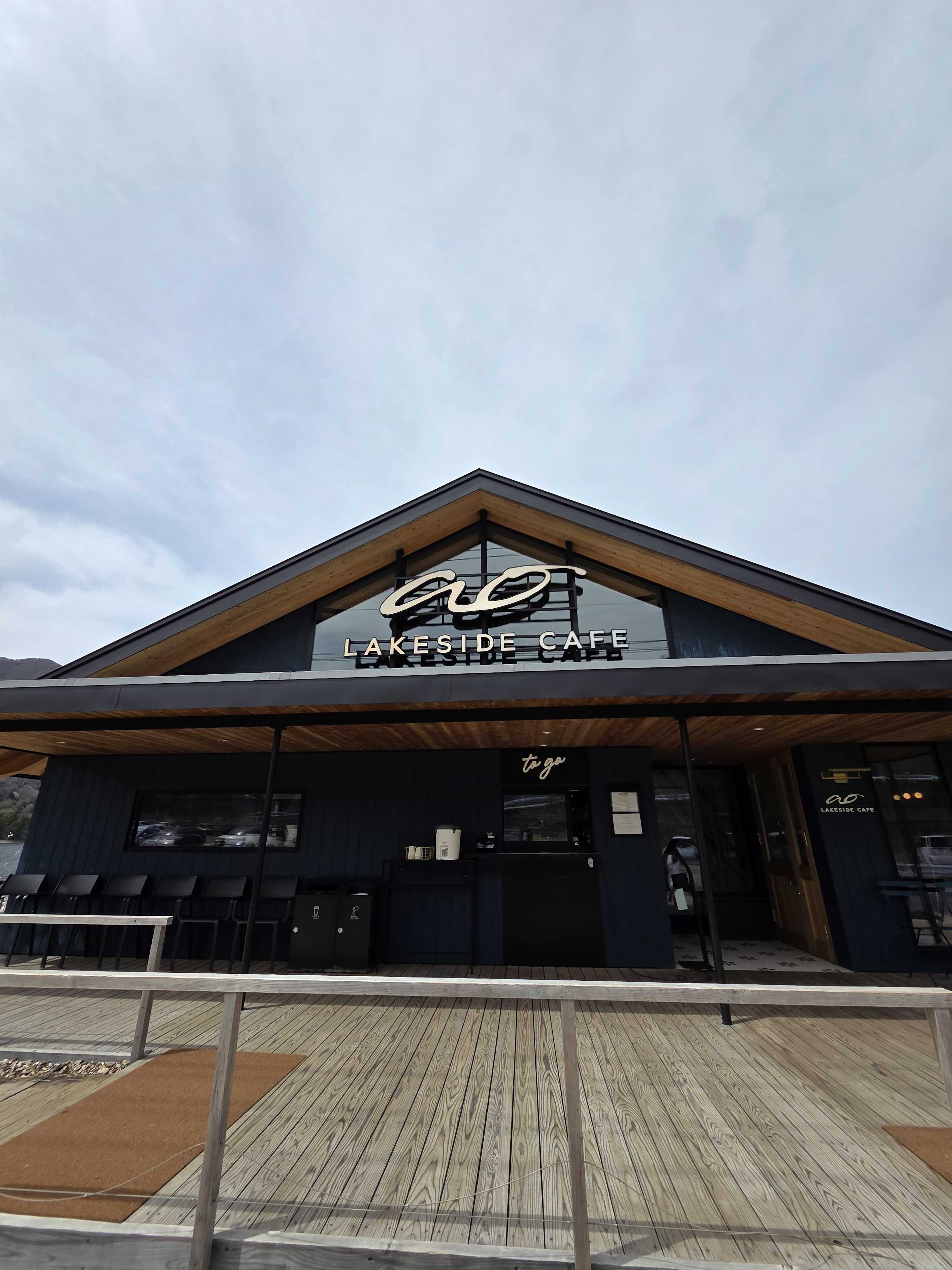 Modern entrance of ao LAKESIDE CAFE with clear signage